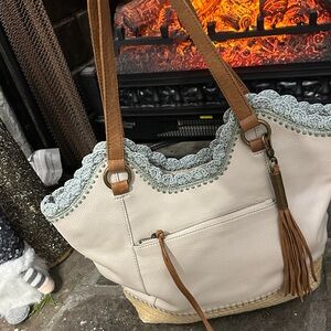 Elegant leather tote bag by the Sak